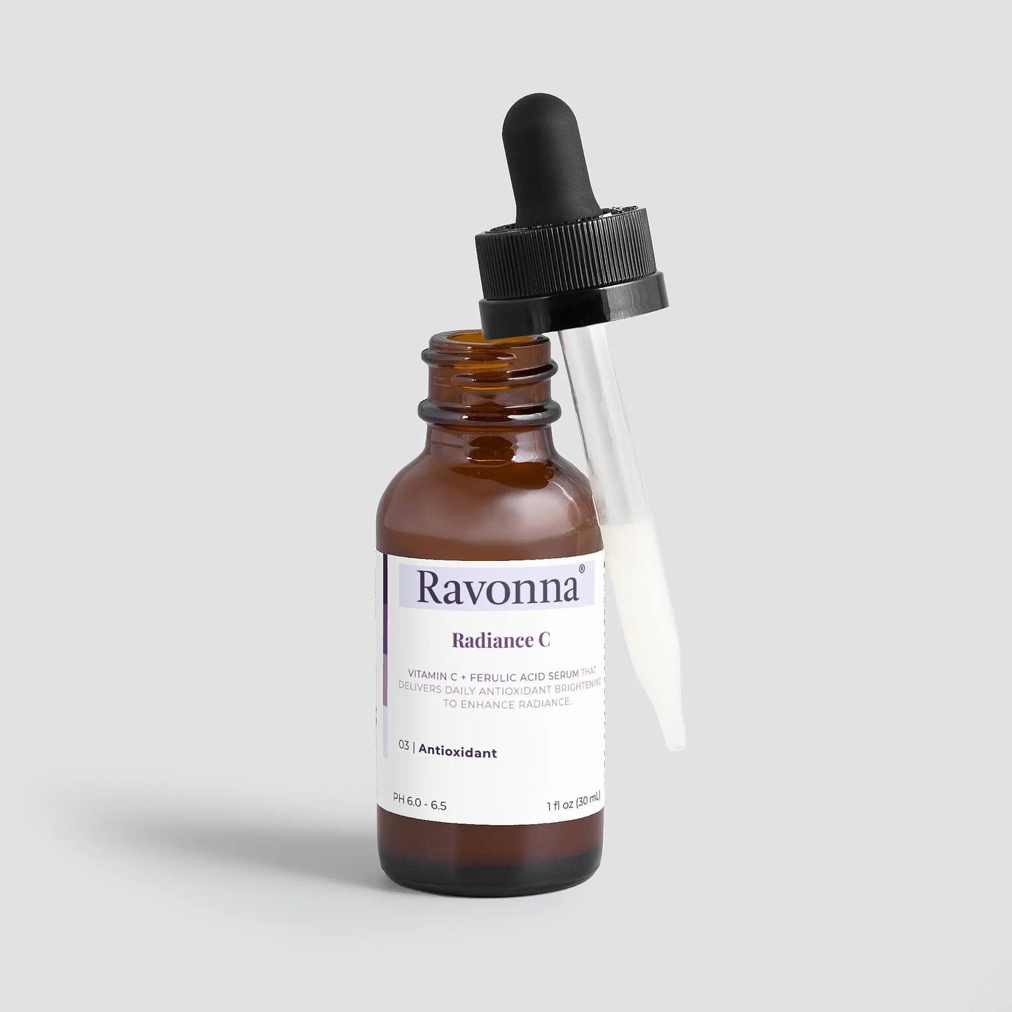 Radiance Serum bottle upright on minimal background – Ravonna