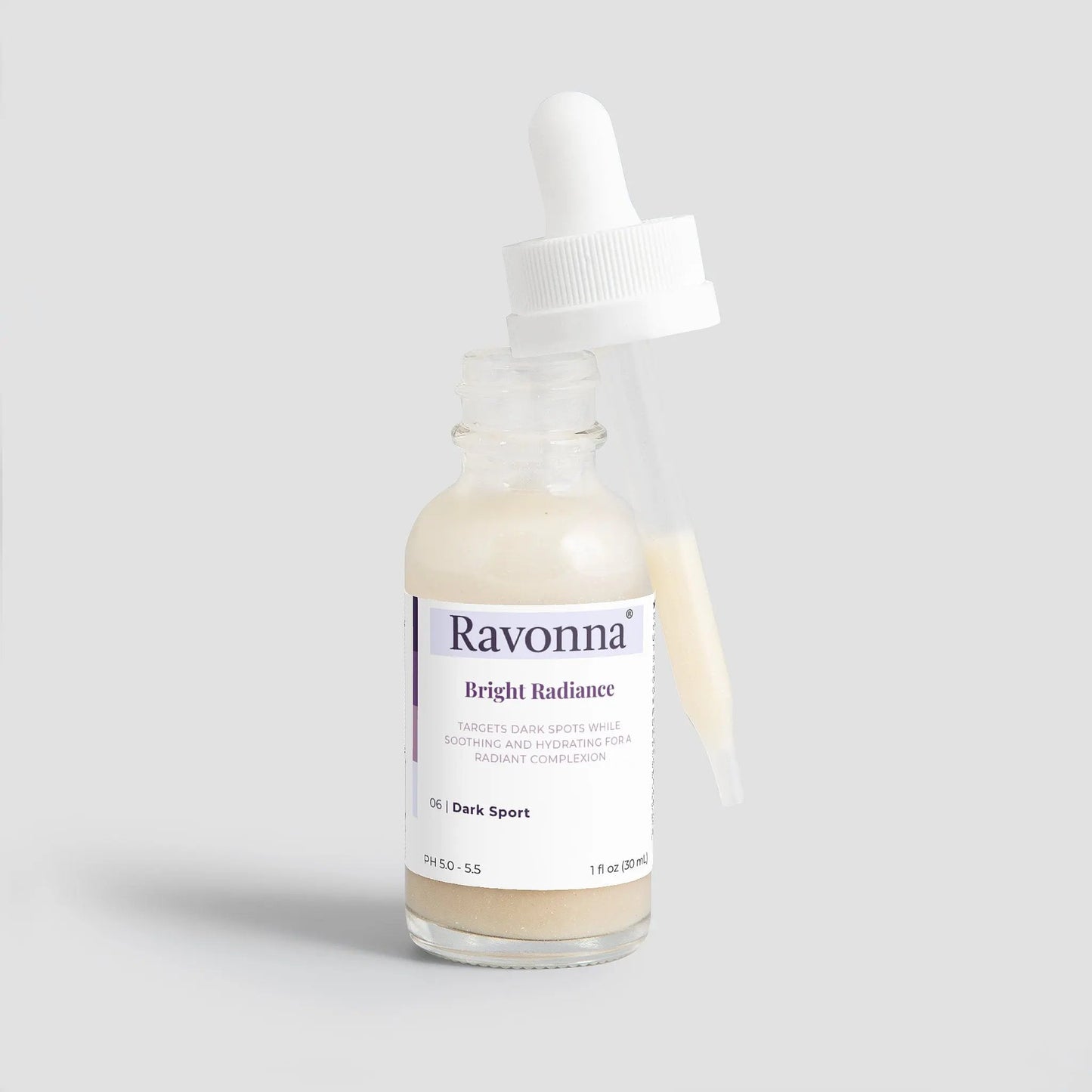 Bright Radiance Serum upright bottle on minimal background – Ravonna