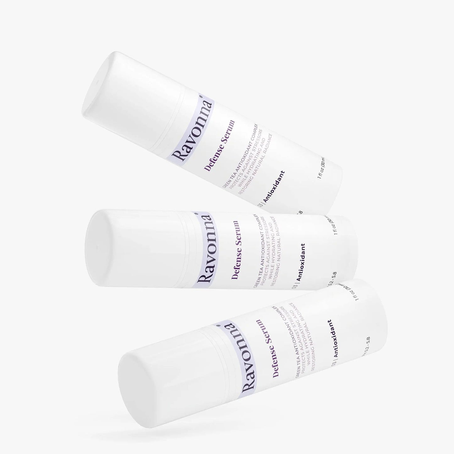 Flat lay of multiple Defense Serum bottles – Ravonna