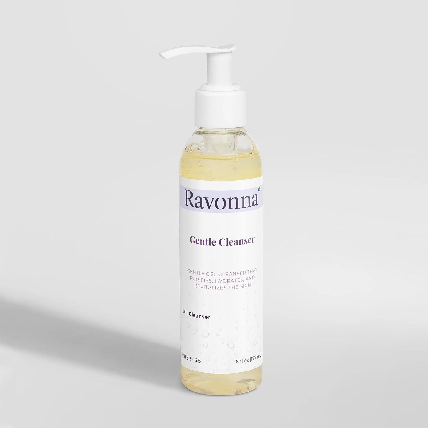 Gentle Cleanser standing bottle on minimal surface – Ravonna