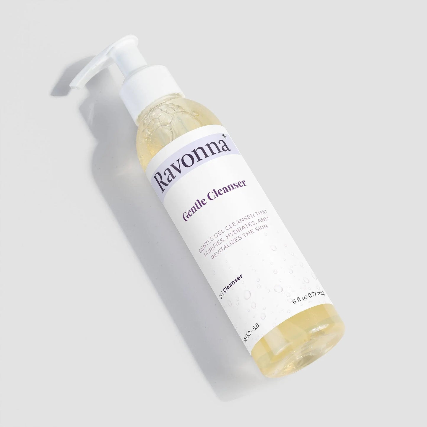 Flat lay of Gentle Cleanser bottle with reflection – Ravonna