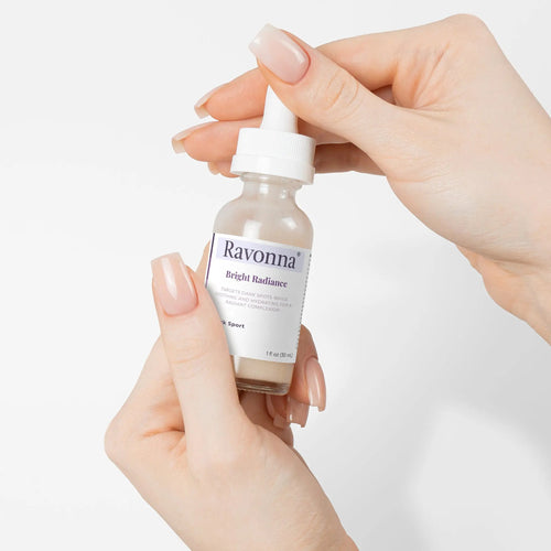 Applying Bright Radiance Serum with dropper – Ravonna