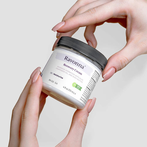 Applying Recovery Cream from jar with fingertips – Ravonna